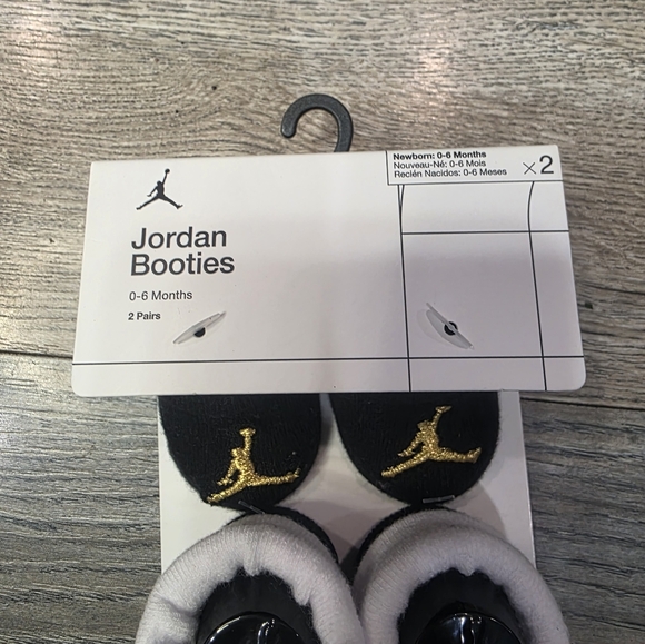 Jordan Baby Booties Black and Gold 0-6 Months NWT - Picture 3 of 4
